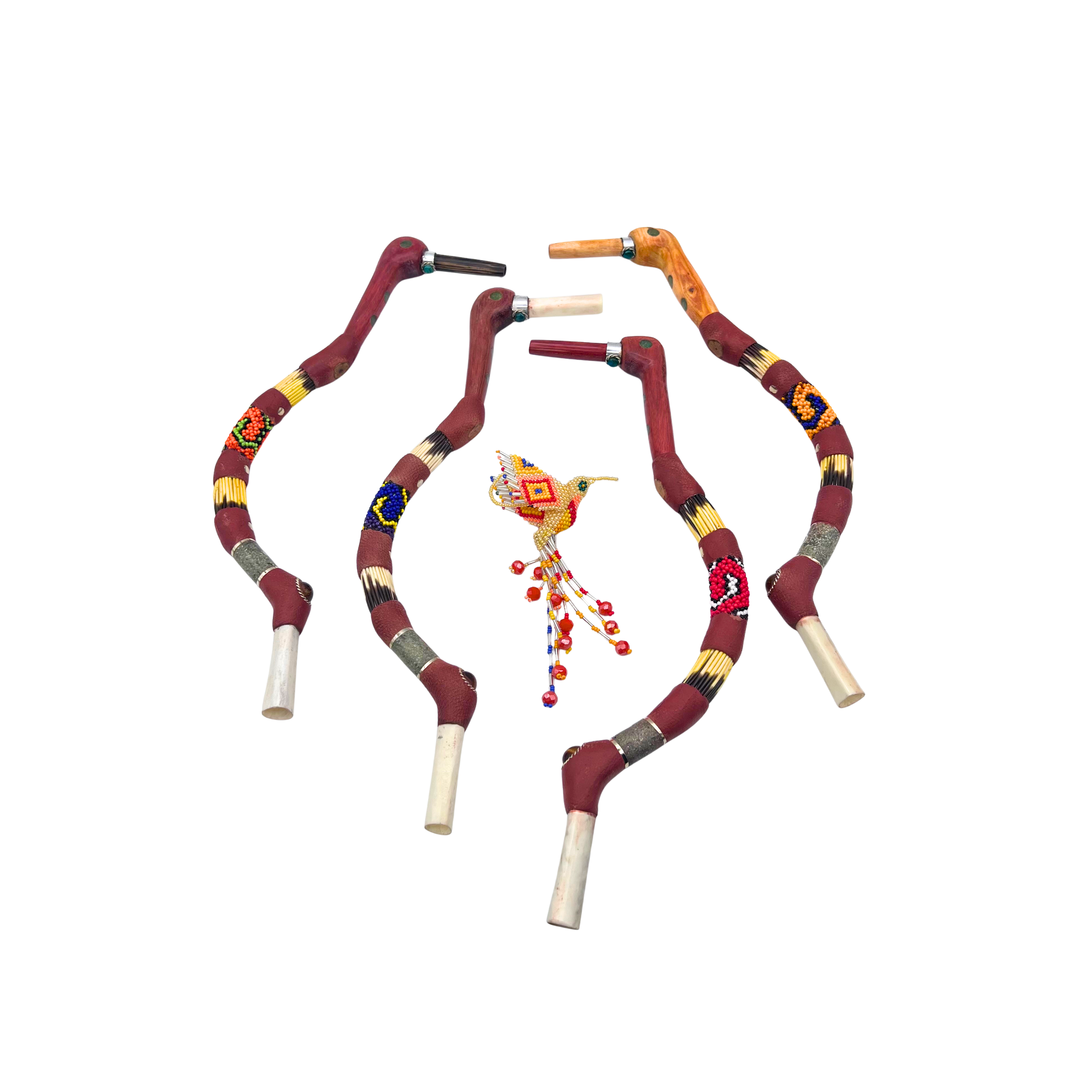 Handcrafted Hummingbird Tepis (hape applicator) made from Palo Sangre, Palo Santo, Chonta wood, or bone: each adorned with colorful Shipibo beadwork, symbolizing joy, movement, and the sacred rhythm of ceremony.