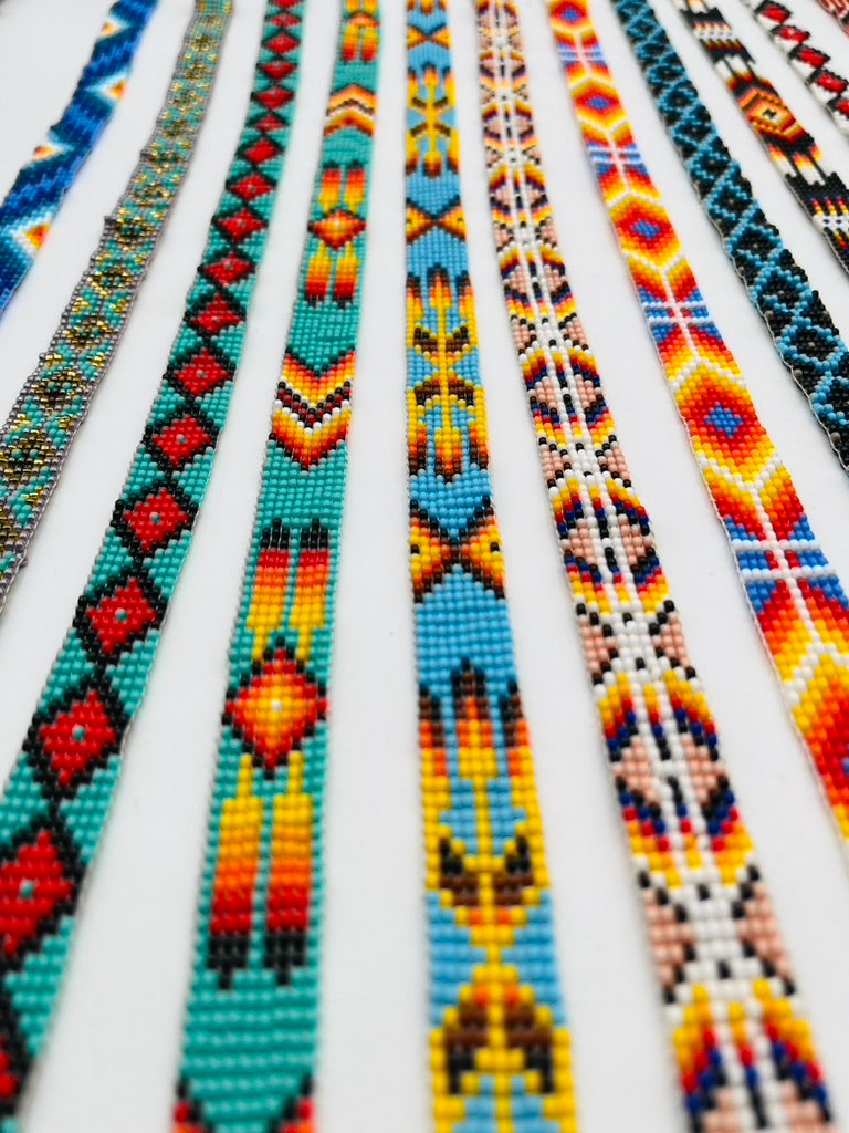 Hand-beaded 9-line tie-up hatband by the Tz’utujil collective of Guatemala, crafted with Czech glass beads in neutral tribal patterns.