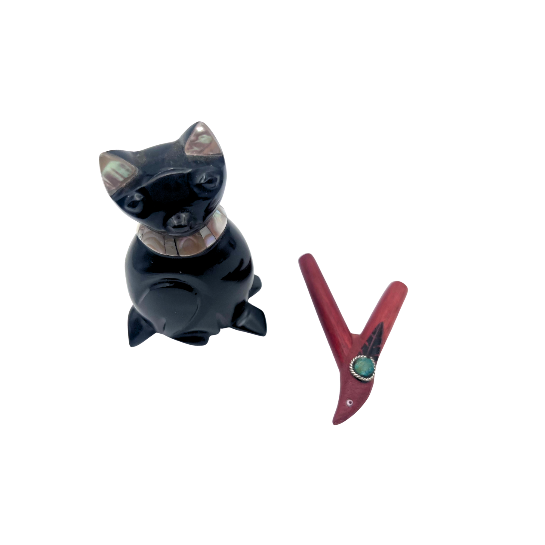 A handcrafted Bird Kuripe made from Amazonian Palo Sangre, designed with bird-shaped tips symbolizing upper-world vision and spiritual connection.