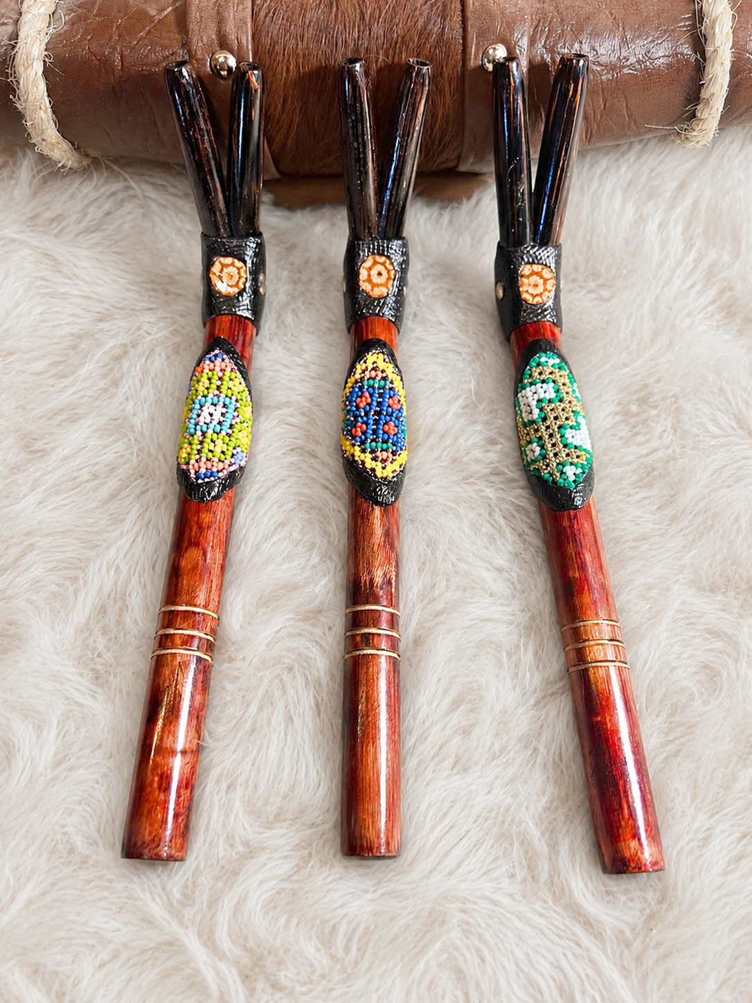 Handcrafted double-nostril bamboo Tepi Hapé applicators by Collective Journey Art with colorful beadwork, Tiger’s Eye accents, and Palo Sangre or Chonta wood.