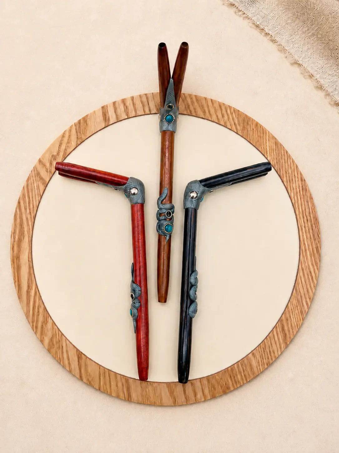 Handcrafted Double Snake Tepi by Collective Journey Art, a double-nostril Hapé serving applicator with carved serpent details and a natural chrysocolla accent.