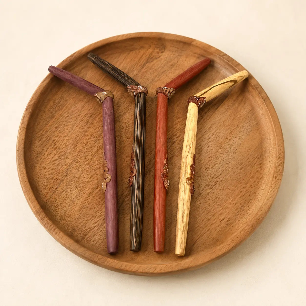 Handcrafted Serpent Tepi Hapé serving applicators by Collective Journey Art in Palo Sangre, Rosewood, Palo Santo, and Chonta wood.