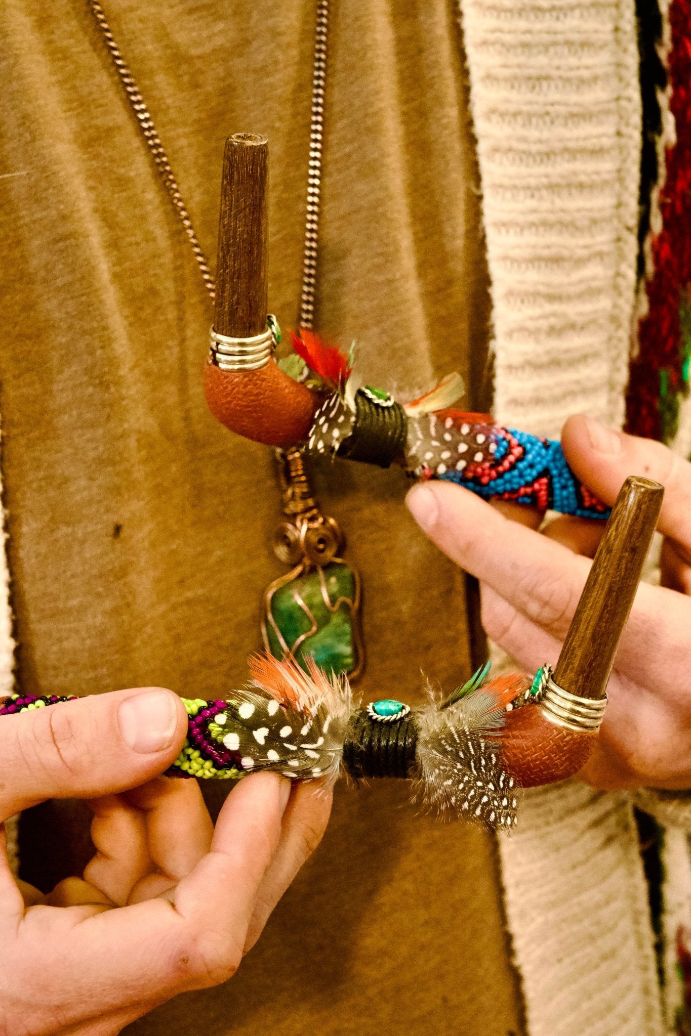Handcrafted Indigenous Tepi Hapé serving applicators by Collective Journey Art, made from Amazonian blackwood with colorful Shipibo-inspired seed-bead patterns.