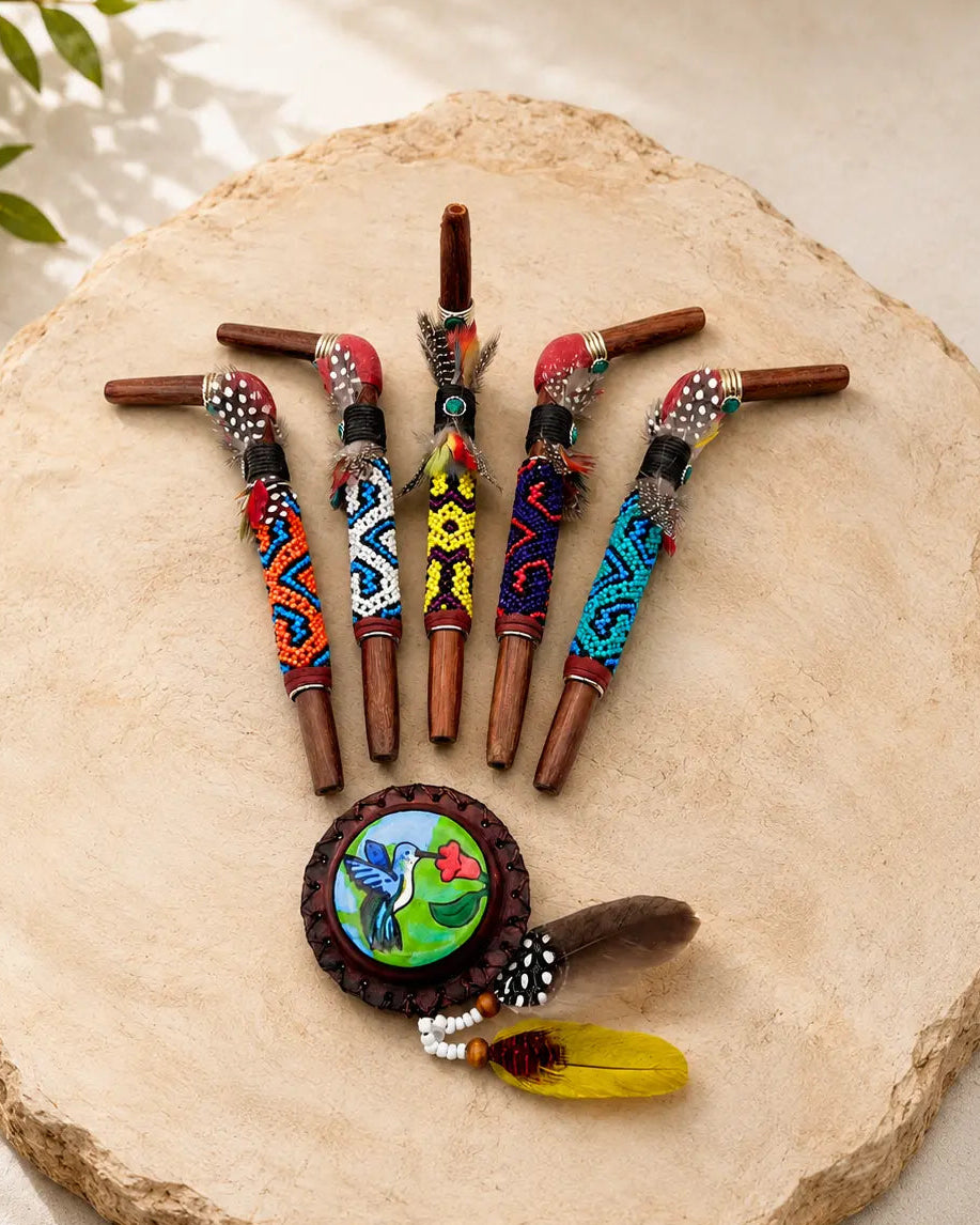 Handcrafted Indigenous Tepi Hapé serving applicators by Collective Journey Art, made from Amazonian blackwood with colorful Shipibo-inspired seed-bead patterns.