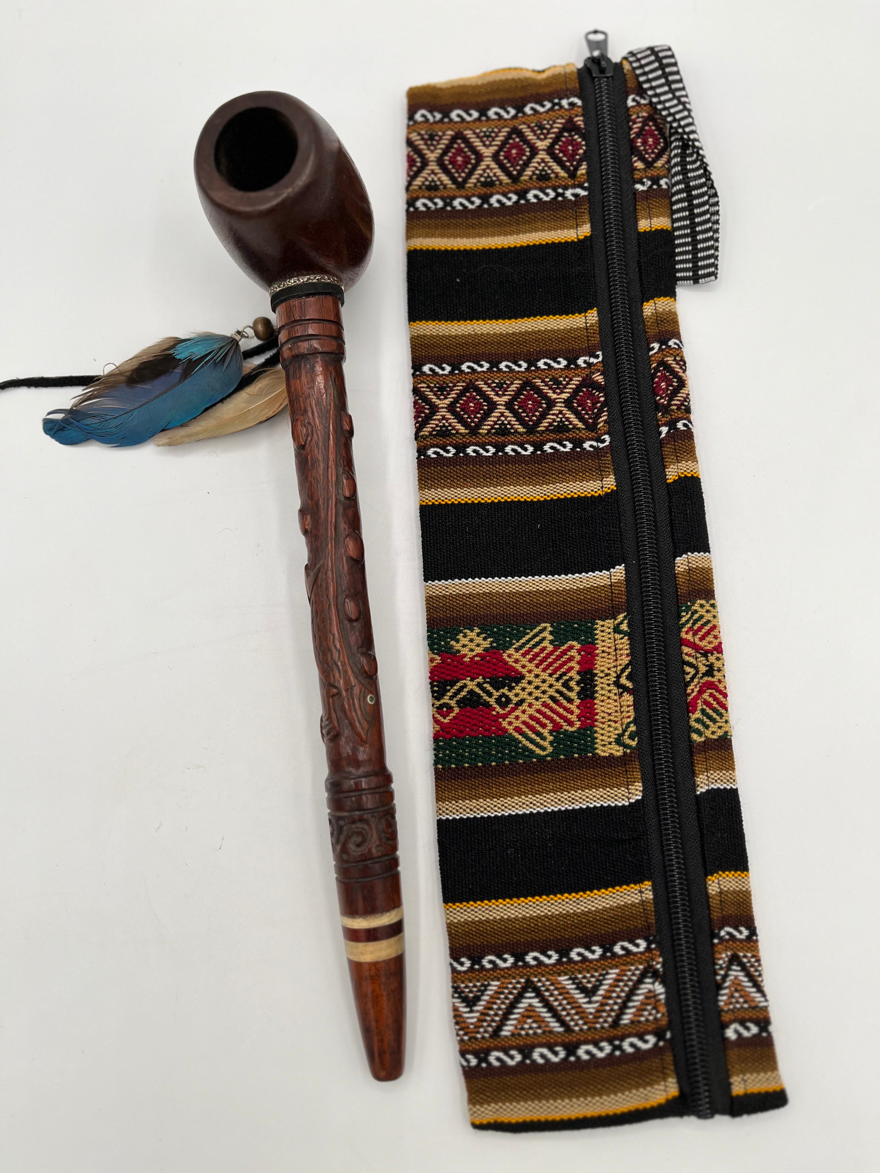 Side view of handcrafted jaguar ceremonial pipe