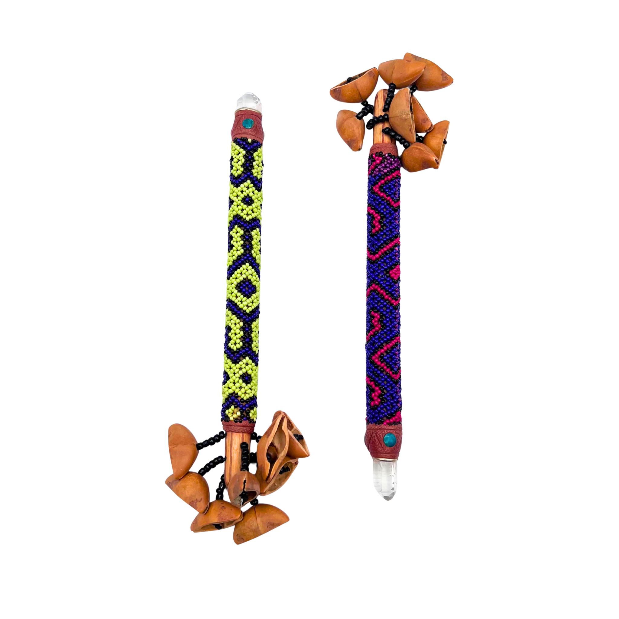Handcrafted Maraca Sona Rattle with colorful Shipibo beadwork and a quartz crystal on one end — adorned with Amazonian seeds and shells, representing clarity and balance.