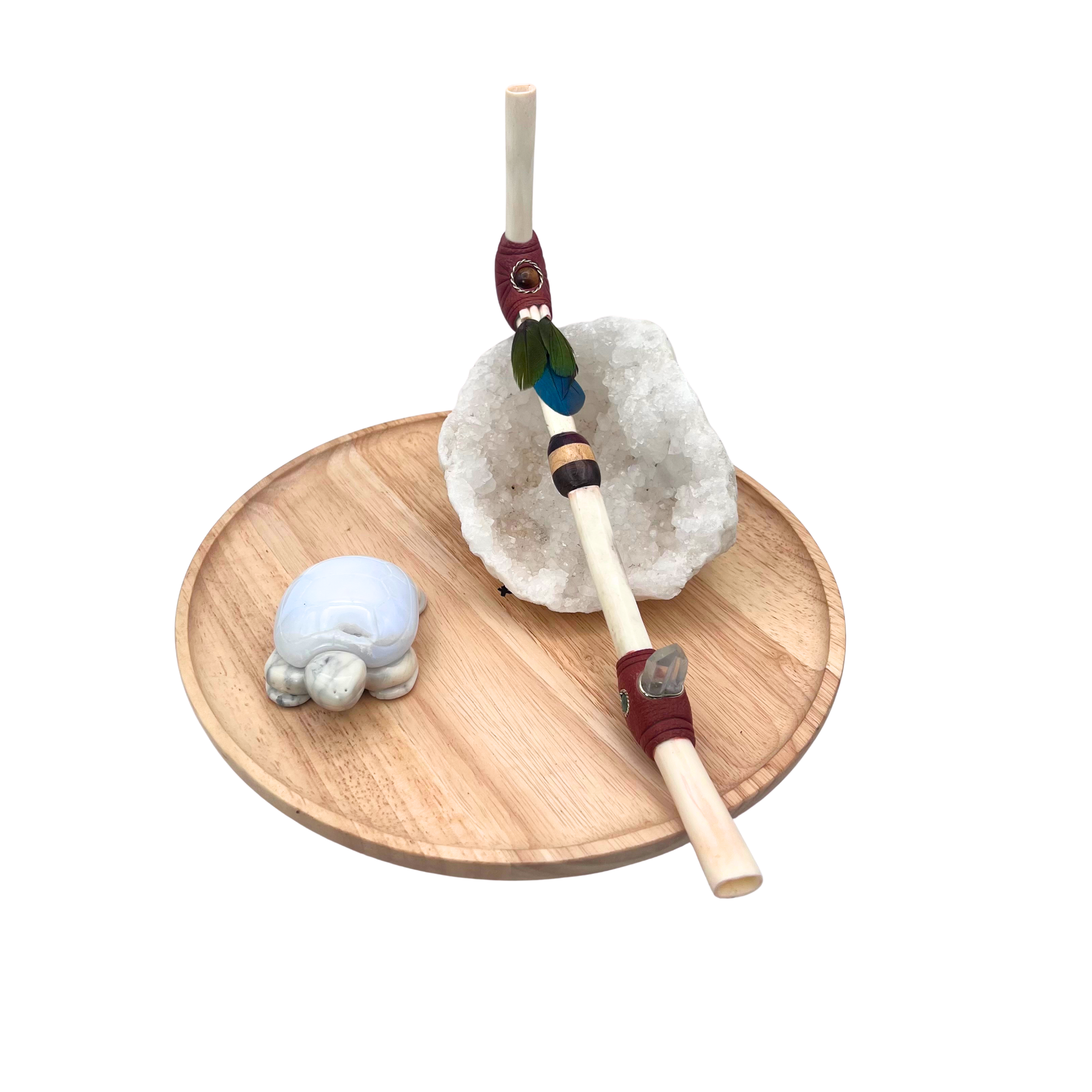 Handcrafted Rainbow Tepi made from sustainably sourced lamb bone — a applicator symbolizing purity, elegance, and efficiency, adorned with vibrant feathers and a quartz crystal for sacred use.