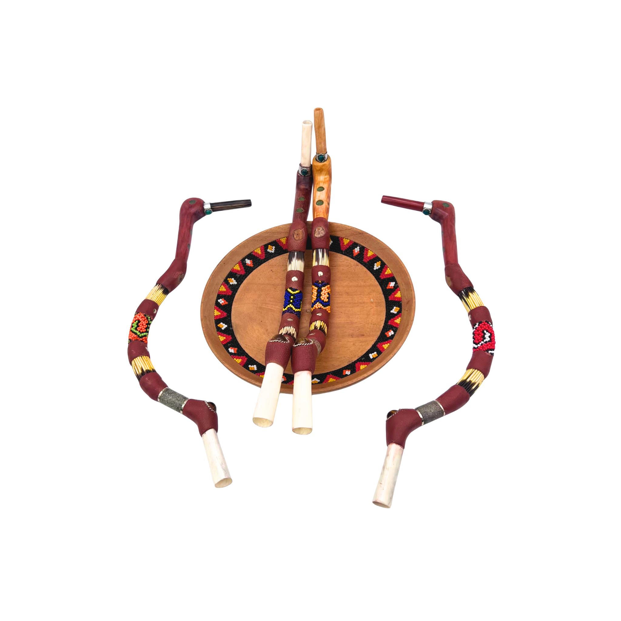 Handcrafted Hummingbird Tepies made from Palo Sangre, Palo Santo, Chonta wood, or bone — each adorned with colorful Shipibo beadwork, symbolizing joy, movement, and the sacred rhythm of ceremony.